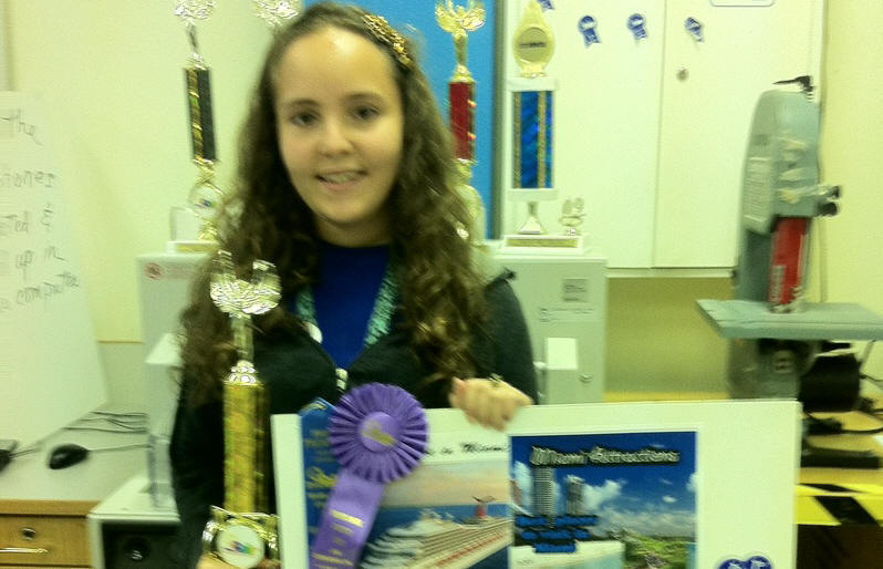 Student that won trophy for her project